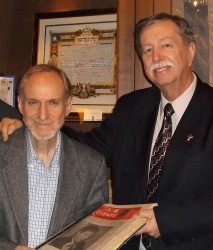 Library Archivist Don Gantz receives The Remnant Newspaper Collection from Jerrell Miller.